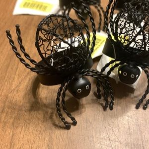 Set of 8 spider napkin rings.